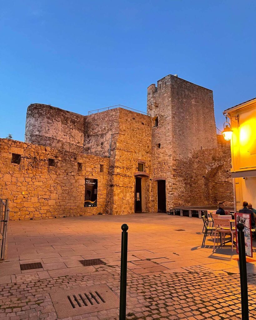 Evening atmosphere in Porto Vecchio old town with restaurants and people walking