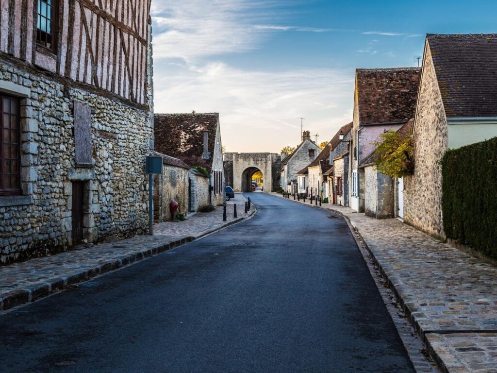 Uneven cobblestone street in Provins showing walking terrain