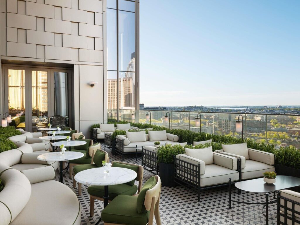 Raffles Boston luxury hotel sky lobby with panoramic city views