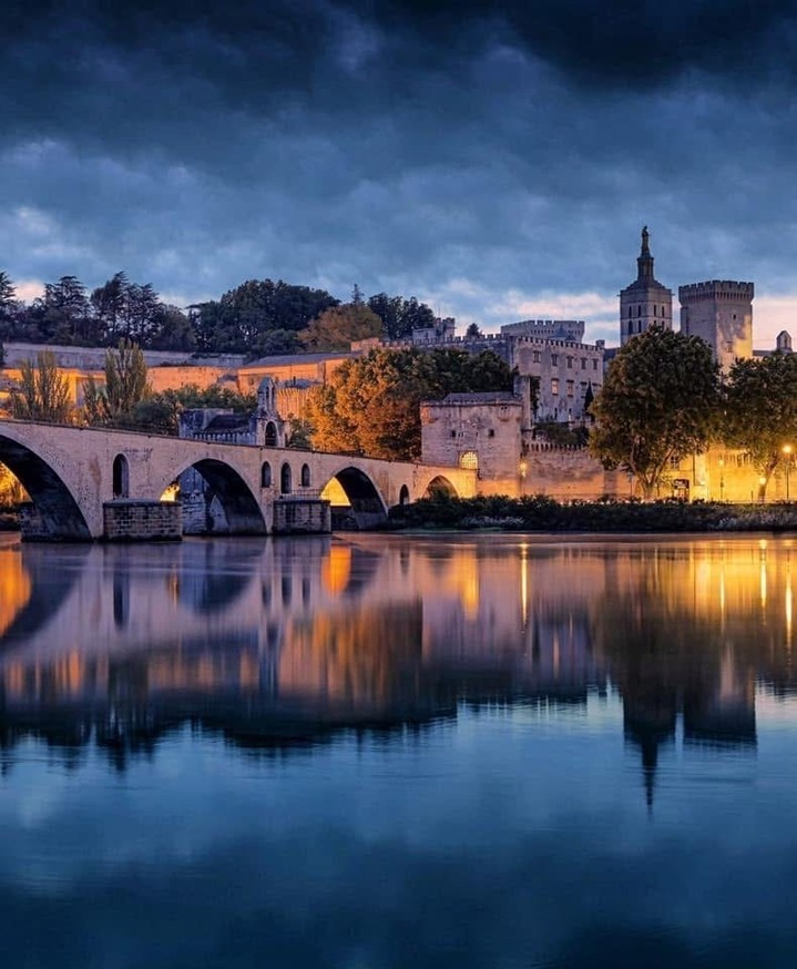 Evening view of Rhône River in Avignon with soft sunset light