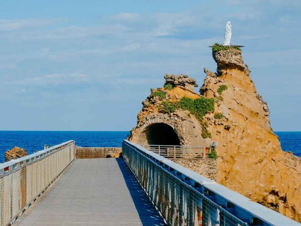 Rocher de la Vierge in Biarritz with bridge and ocean views