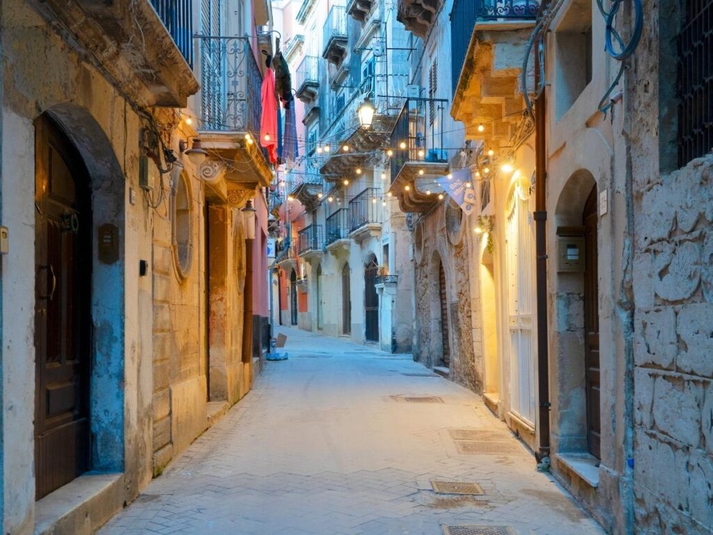 Sartène old town at night with warm lighting and quiet streets