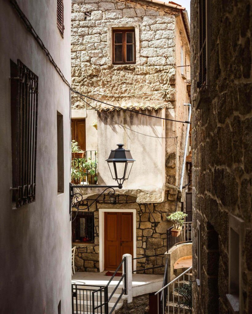 Walking through Sartène old town streets at a slow relaxed pace