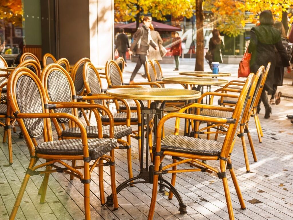 Café table in Saumur with menu and wine glasses