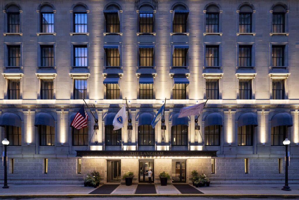 Elegant exterior of The Langham hotel showcasing classic luxury architecture