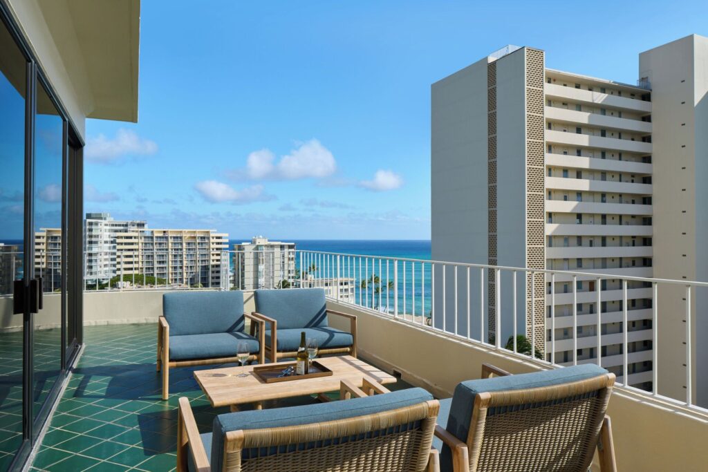 Exterior view of The Lotus Honolulu at Diamond Head featuring a peaceful boutique setting near Diamond Head, ocean and park views, modern rooms, and a tranquil escape from central Waikiki.