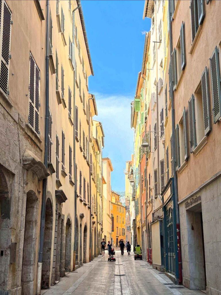 Narrow streets in Toulon Old Town with colorful buildings and local cafés
