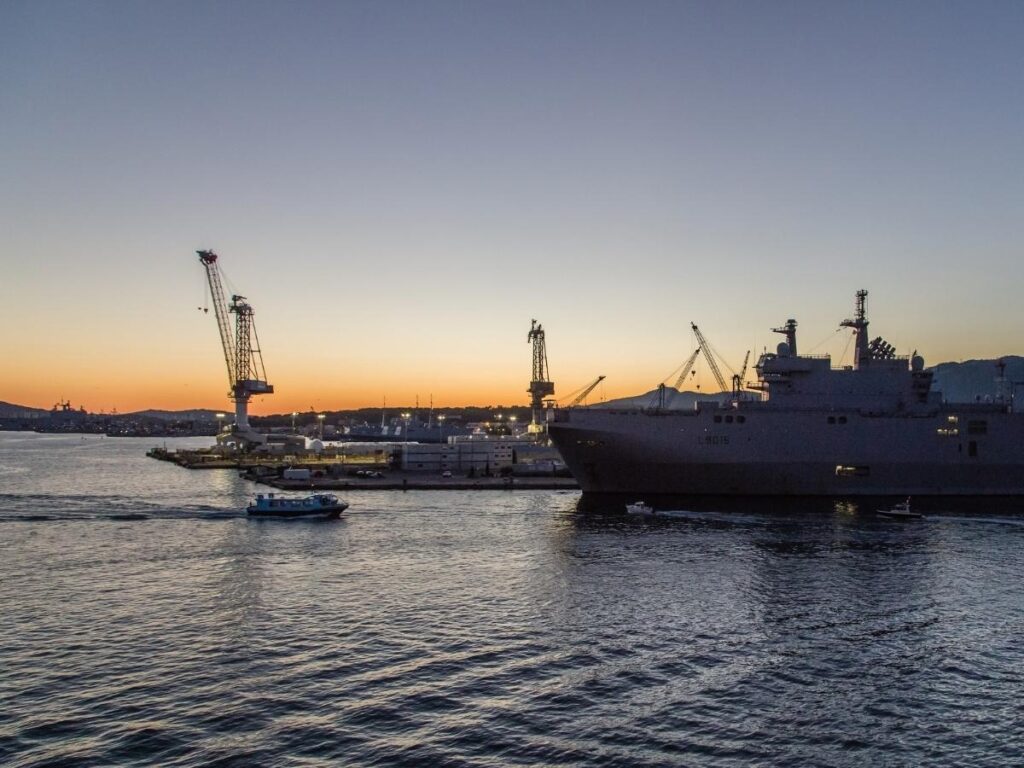 Toulon harbor at sunset with calm water and soft evening light
