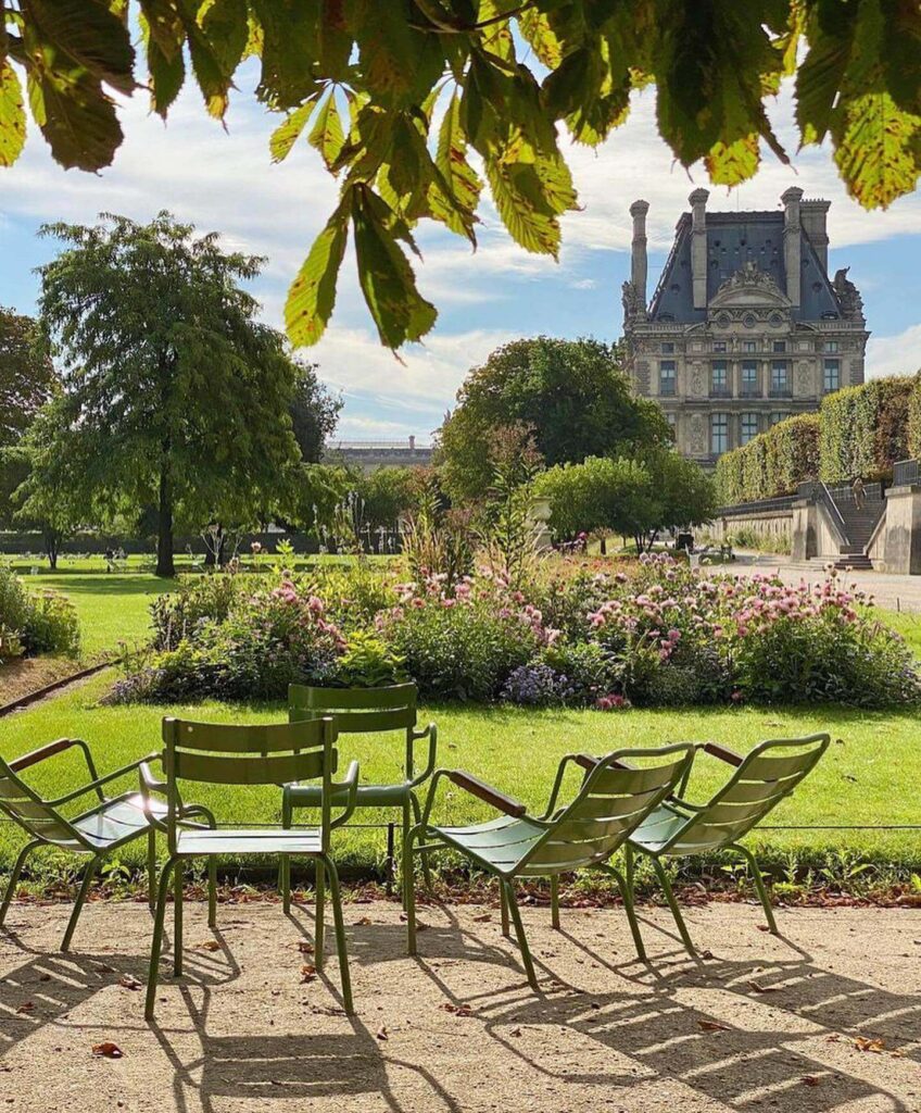Tuileries Garden in Paris with chairs and trees near the Louvre