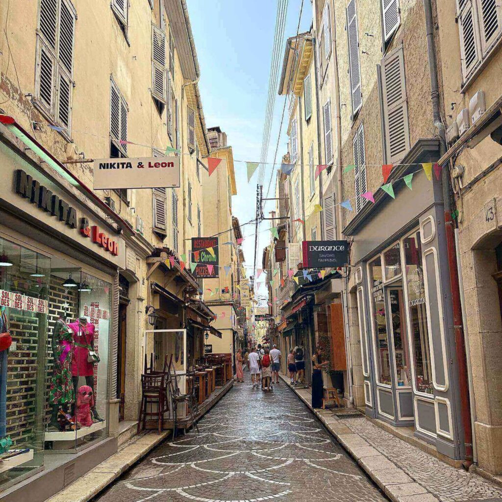 Quiet morning street in Antibes Old Town with soft light