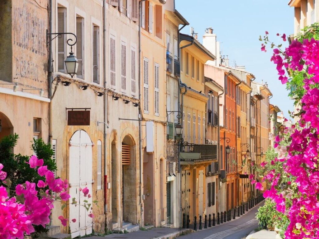 Walking through narrow streets in Aix-en-Provence Old Town