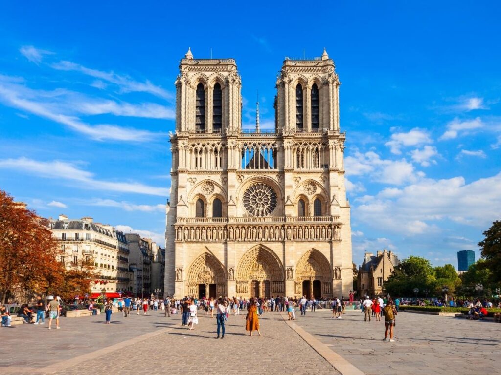 Walking toward Notre Dame cathedral through Paris streets