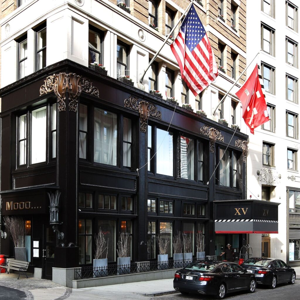 Exterior of XV Beacon hotel in Beacon Hill Boston with historic architecture