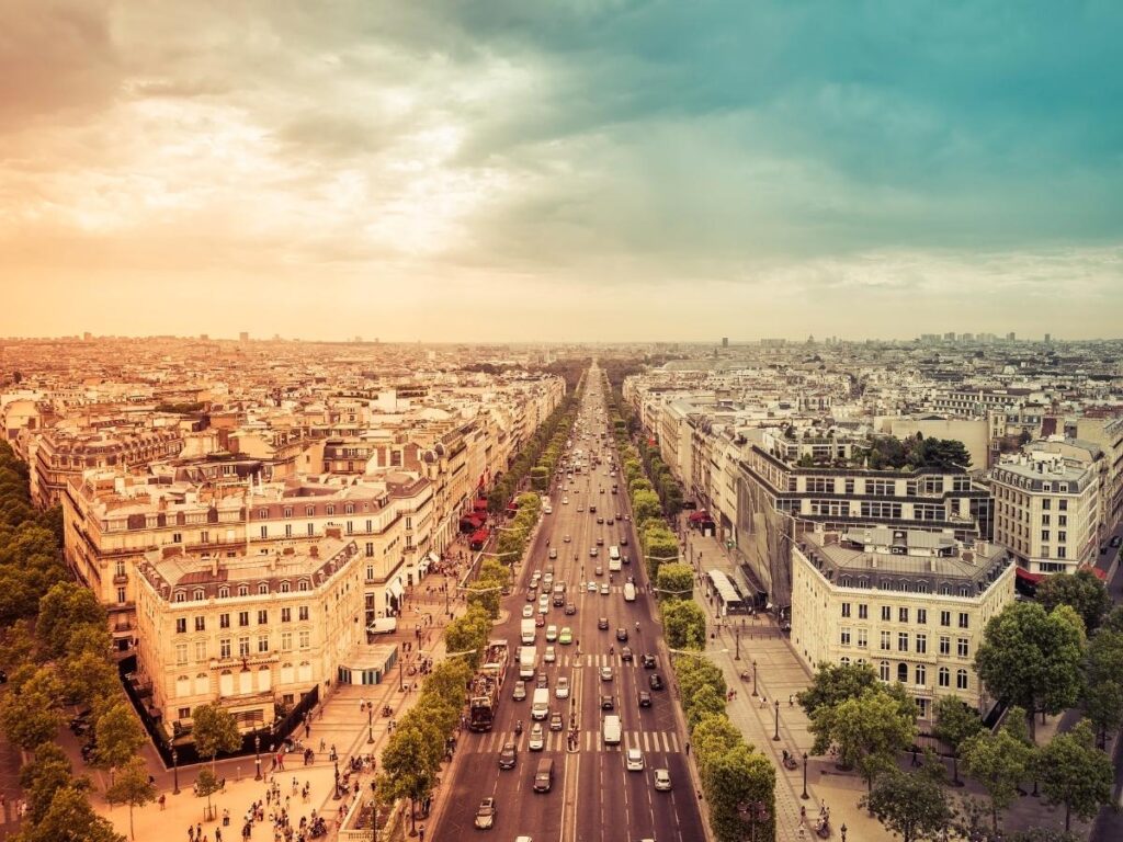 Golden hour view from the Arc de Triomphe rooftop in Paris