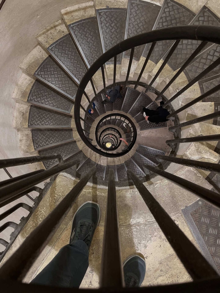 Spiral staircase leading to the rooftop of the Arc de Triomphe