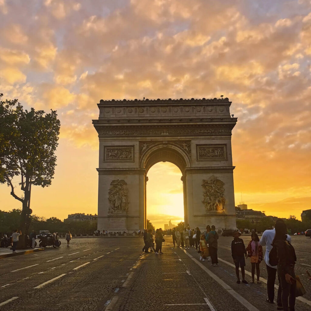 Sunset view from the Arc de Triomphe rooftop in Paris