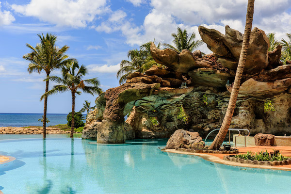 Tropical oceanfront view of Aulani, A Disney Resort & Spa in Ko Olina with family-friendly Hawaiian resort atmosphere