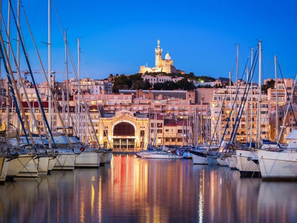 Boats in Marseille harbor below Notre Dame de la Garde