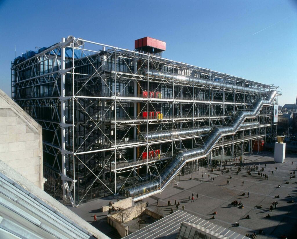 Exterior view of Centre Pompidou in Paris with exposed pipes and colorful structural design