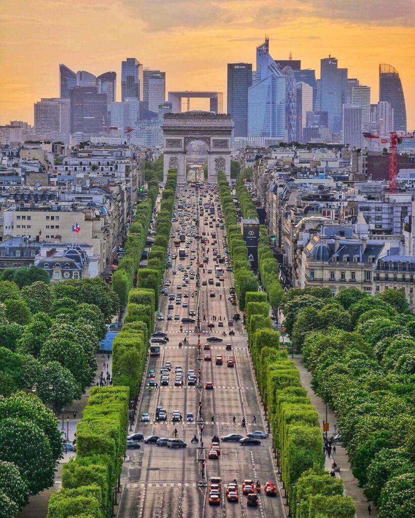 Evening walk along the Champs Élysées near the Arc de Triomphe