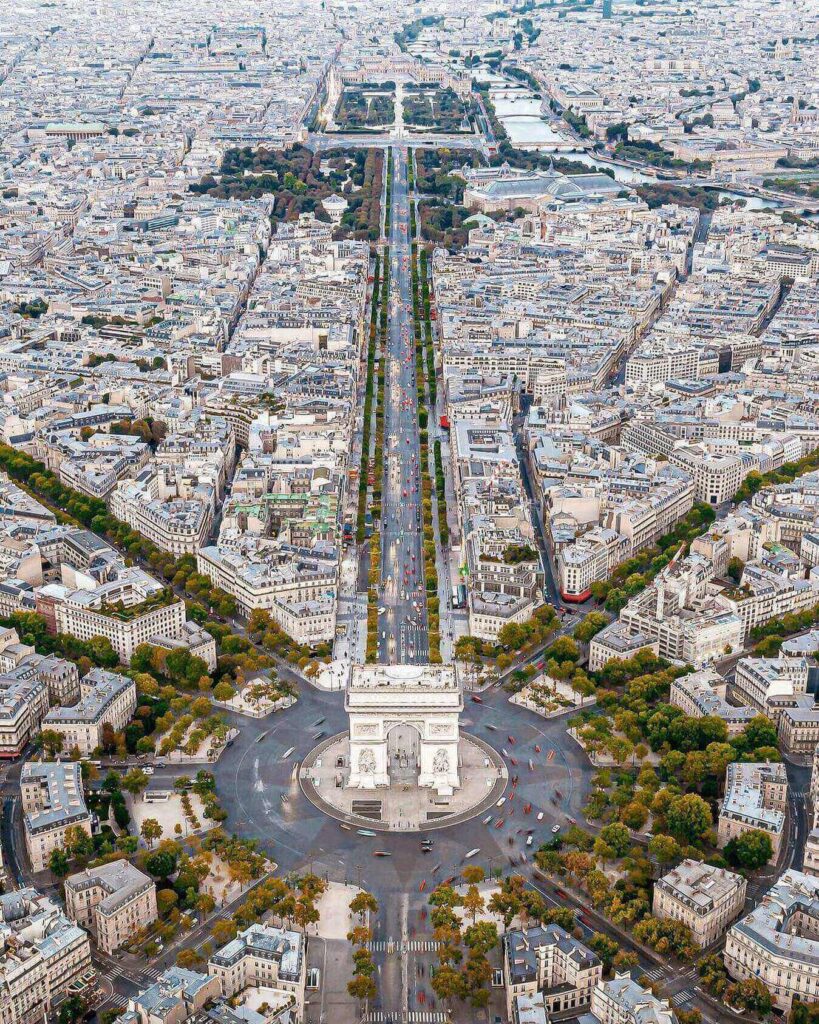 Sunset view down the Champs Élysées from the Arc de Triomphe rooftop