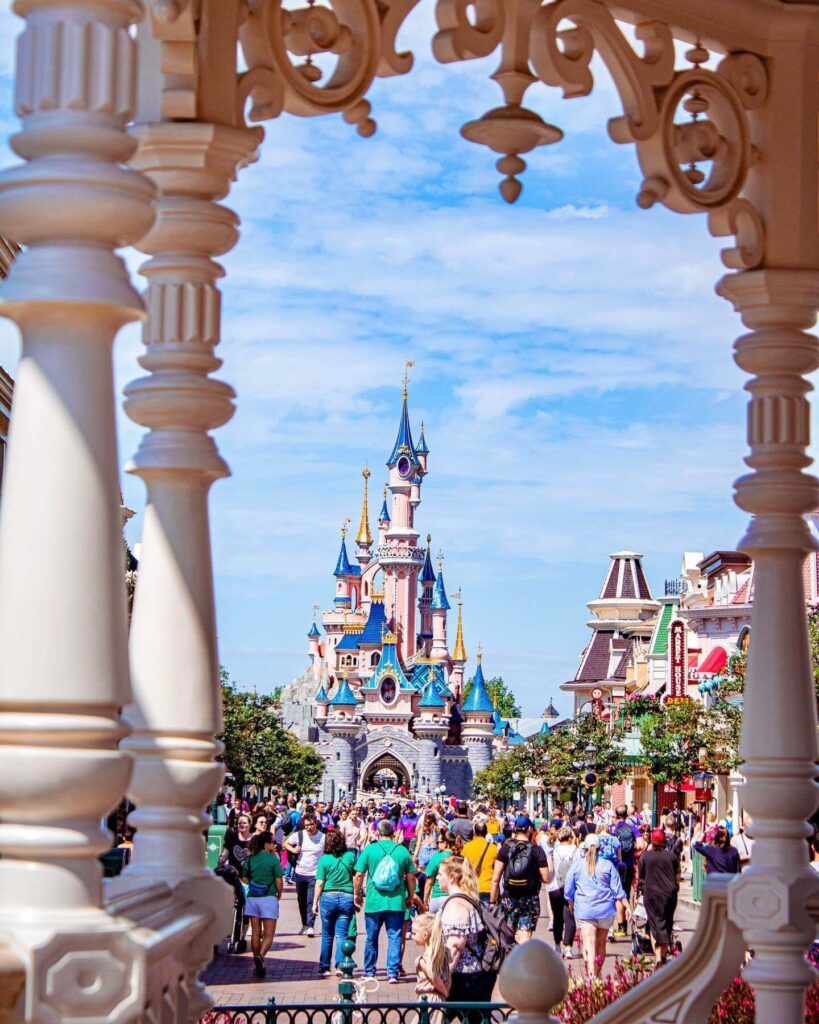 Visitors walking through Main Street U.S.A. at Disneyland Paris