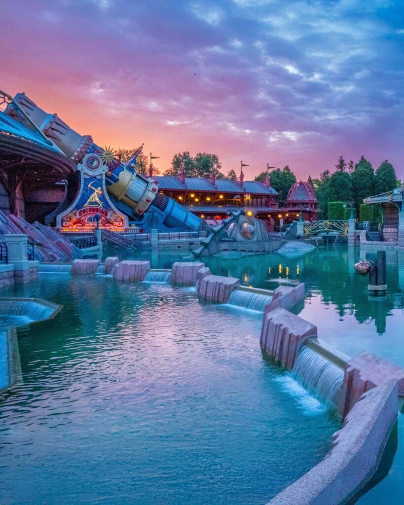 Adults enjoying thrill rides at Disneyland Paris