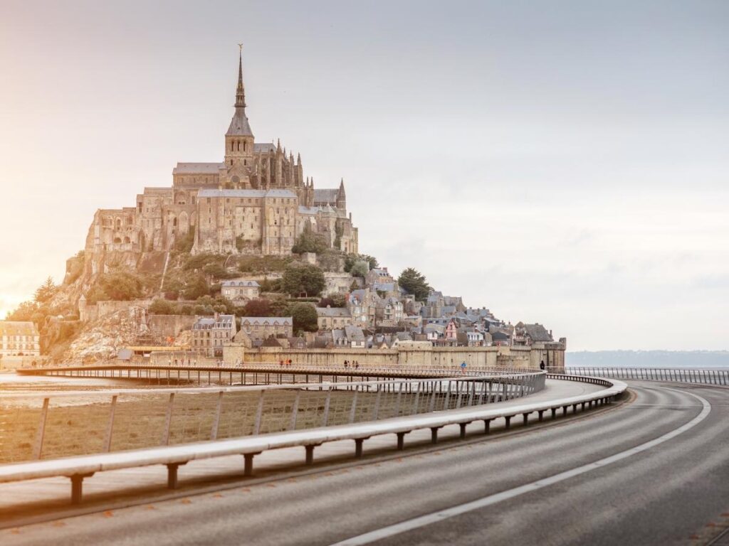 Countryside road leading toward Mont Saint Michel in Normandy