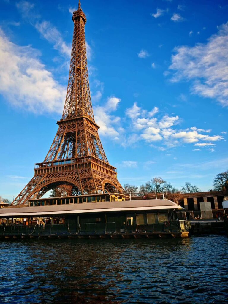 Eiffel Tower seen from the Seine riverbank while walking in Paris