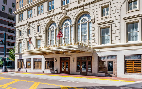 Exterior view of the historic Floridan Palace Hotel in downtown Tampa, showcasing its grand architecture, vintage luxury charm, elegant entrance, and iconic old-world ambiance.