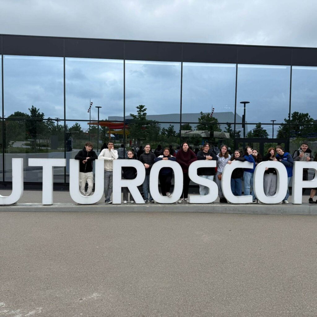 Visitors exploring Futuroscope theme park in France