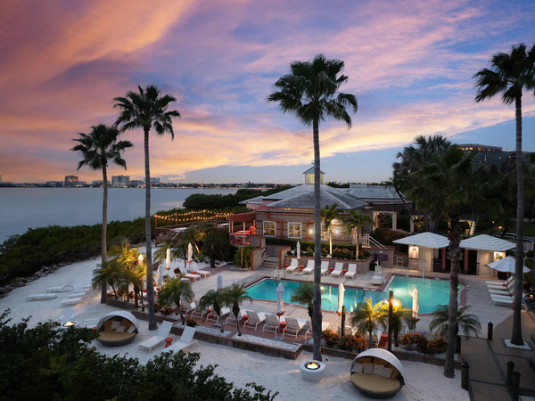 Scenic waterfront view of Grand Hyatt Tampa Bay featuring elegant resort-style architecture, tropical landscaping, peaceful bay views, luxury accommodations, and a relaxing coastal atmosphere in Tampa.