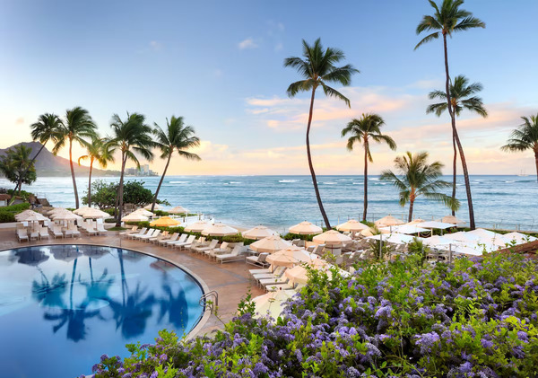 Exterior view of Halekulani showcasing its polished classic luxury and oceanfront elegance in Waikiki