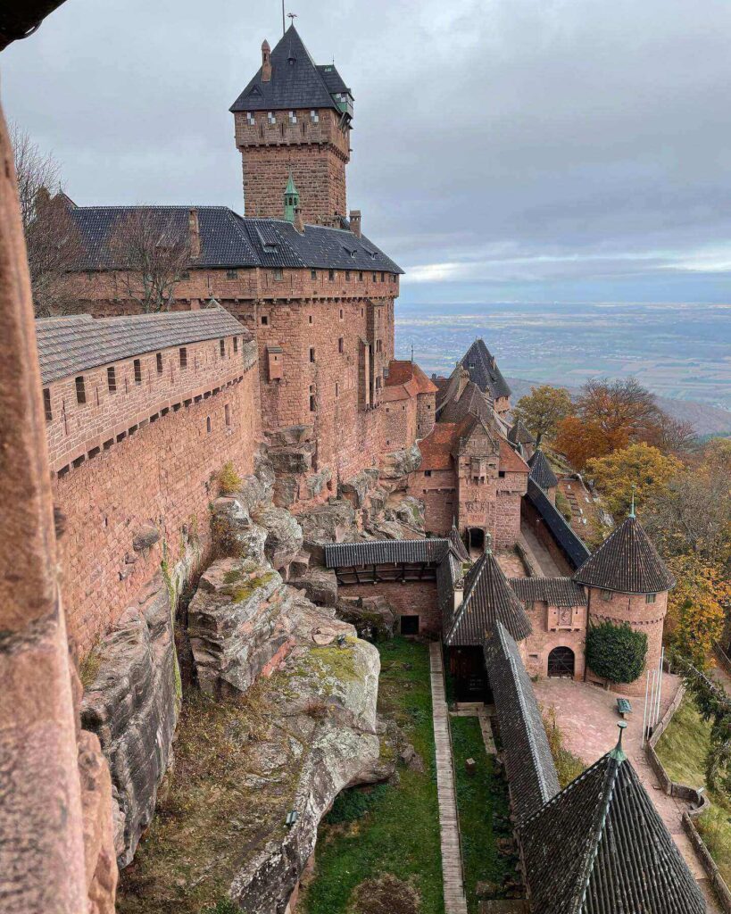 Ancient ruined walls of Château du Haut-Kœnigsbourg surrounded by forest