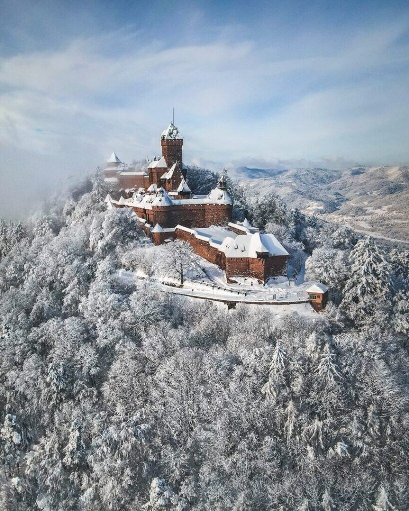 Snow-covered Château du Haut-Kœnigsbourg during winter