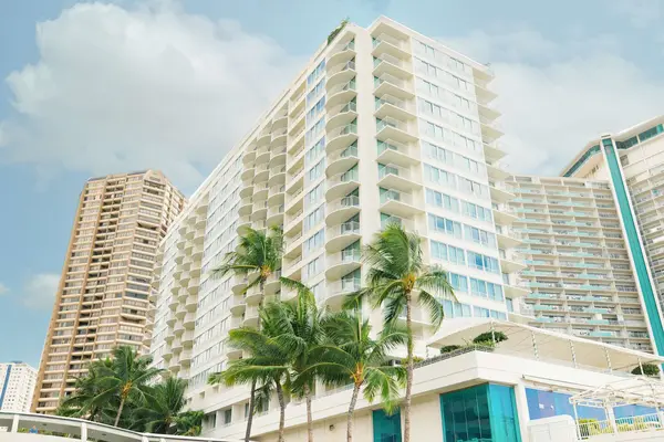 Sleek urban resort exterior of Hilton Vacation Club The Modern Honolulu featuring contemporary luxury accommodations near Waikiki and Ala Moana in Hawaii.