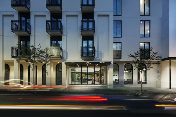 Stylish view of Hotel Haya in Ybor City featuring Cuban-inspired design, boutique luxury interiors, vibrant cultural atmosphere, tropical accents, and historic Tampa charm blended with modern elegance.