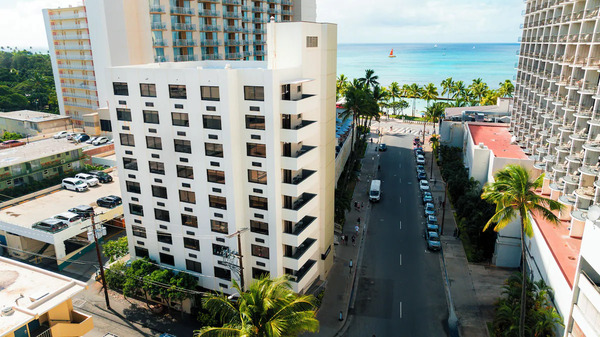 Contemporary boutique exterior of Hotel Renew located near Waikiki Beach with modern island-inspired design in Hawaii.