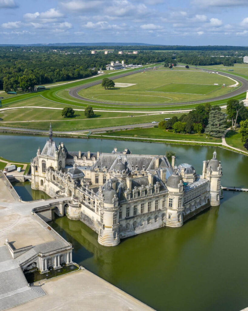 Visitors exploring Château de Chambord in France