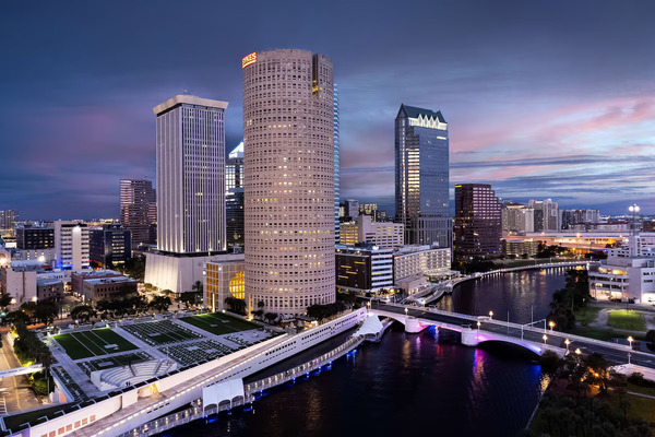 Modern Hyatt Place Tampa/Busch Gardens hotel featuring stylish guest rooms, contemporary lobby design, outdoor pool area, and convenient accommodations near Busch Gardens Tampa Bay.