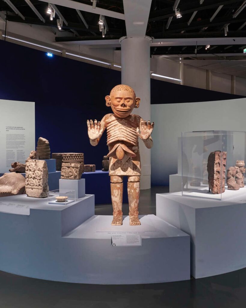 Ceremonial masks and sculptures displayed at Musée du quai Branly