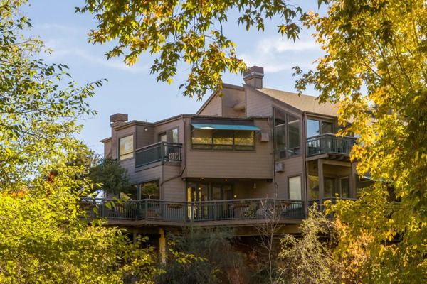 Inn Above Oak Creek peaceful creekside retreat surrounded by lush trees and Sedona red rocks