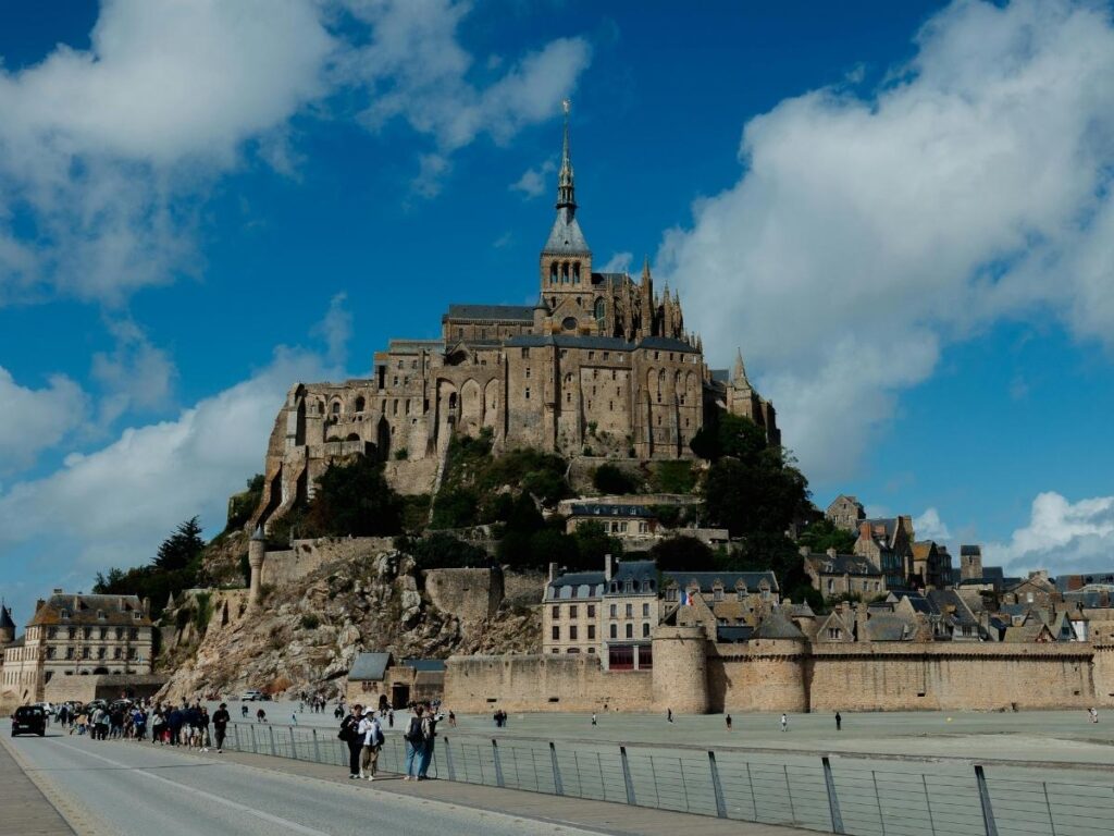 Visitors entering Mont Saint Michel Abbey