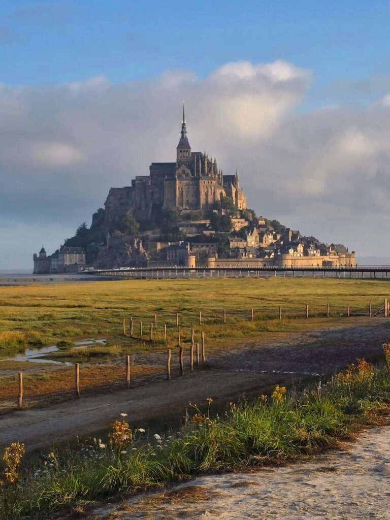 Mont Saint Michel viewed from across the tidal bay in Normandy