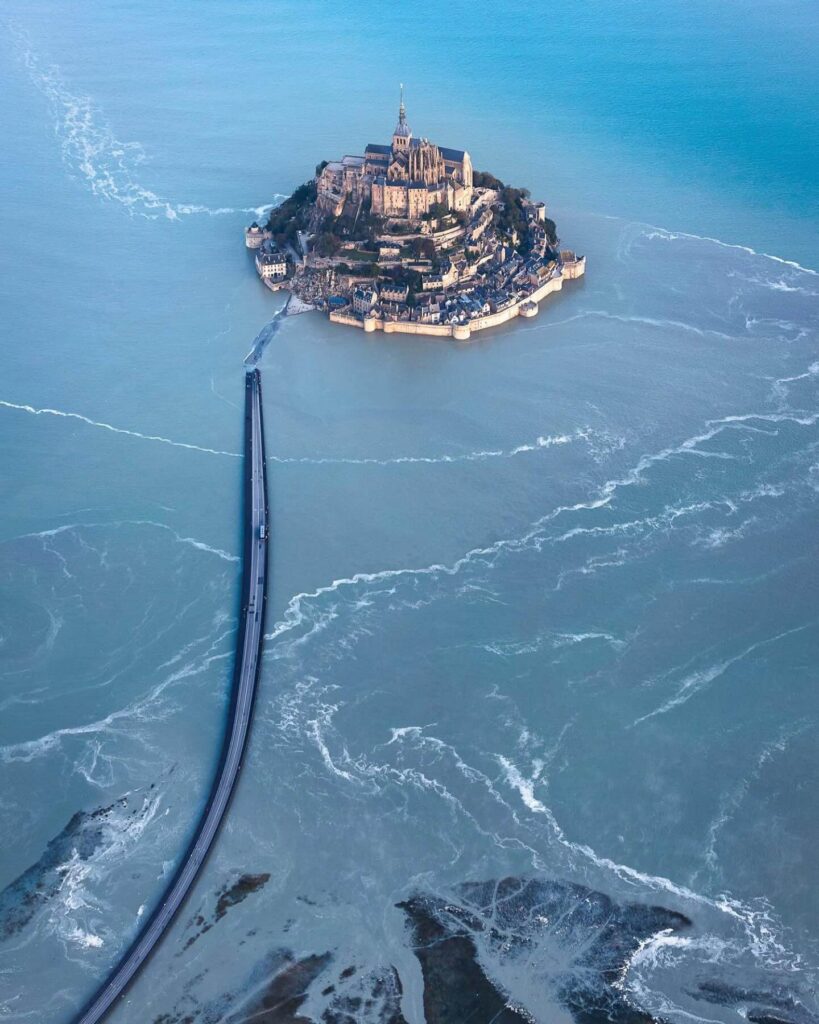 Mont Saint-Michel surrounded by water during high tide
