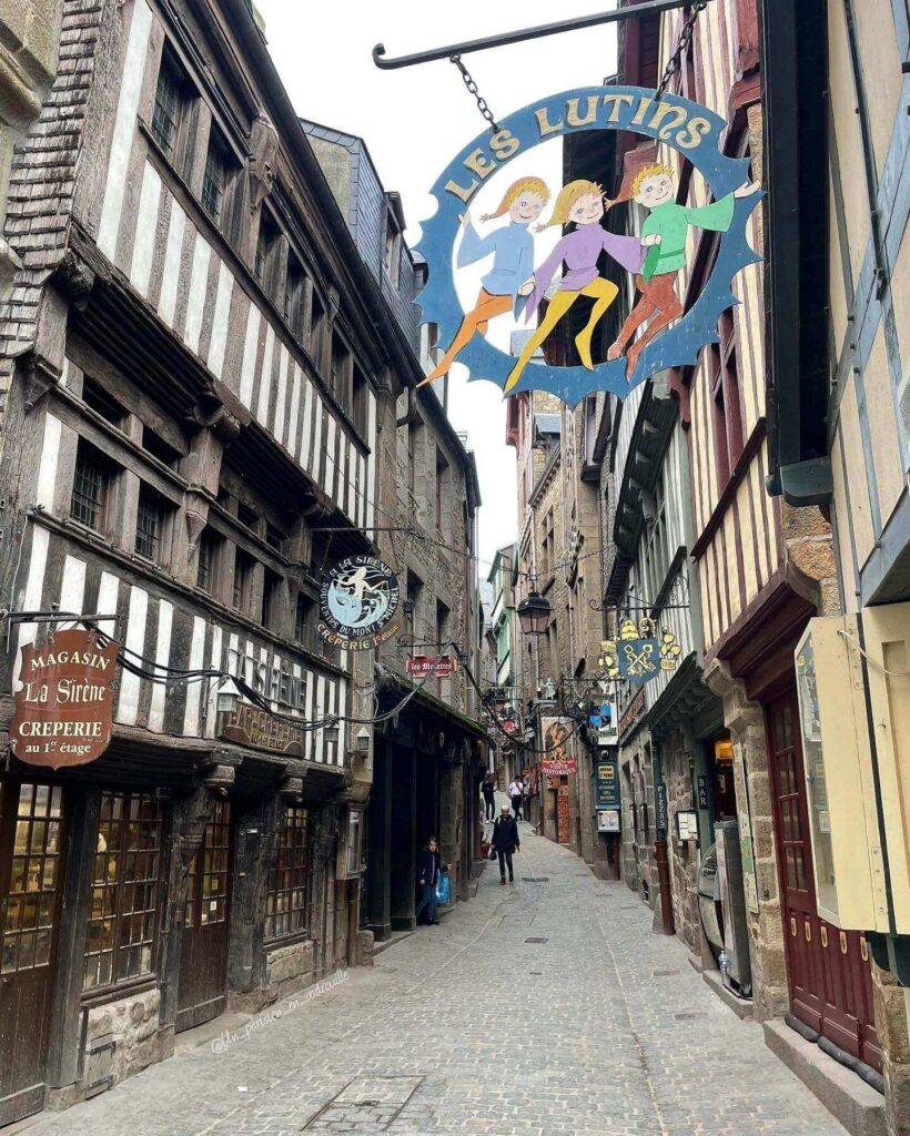 Narrow medieval street inside Mont Saint Michel village