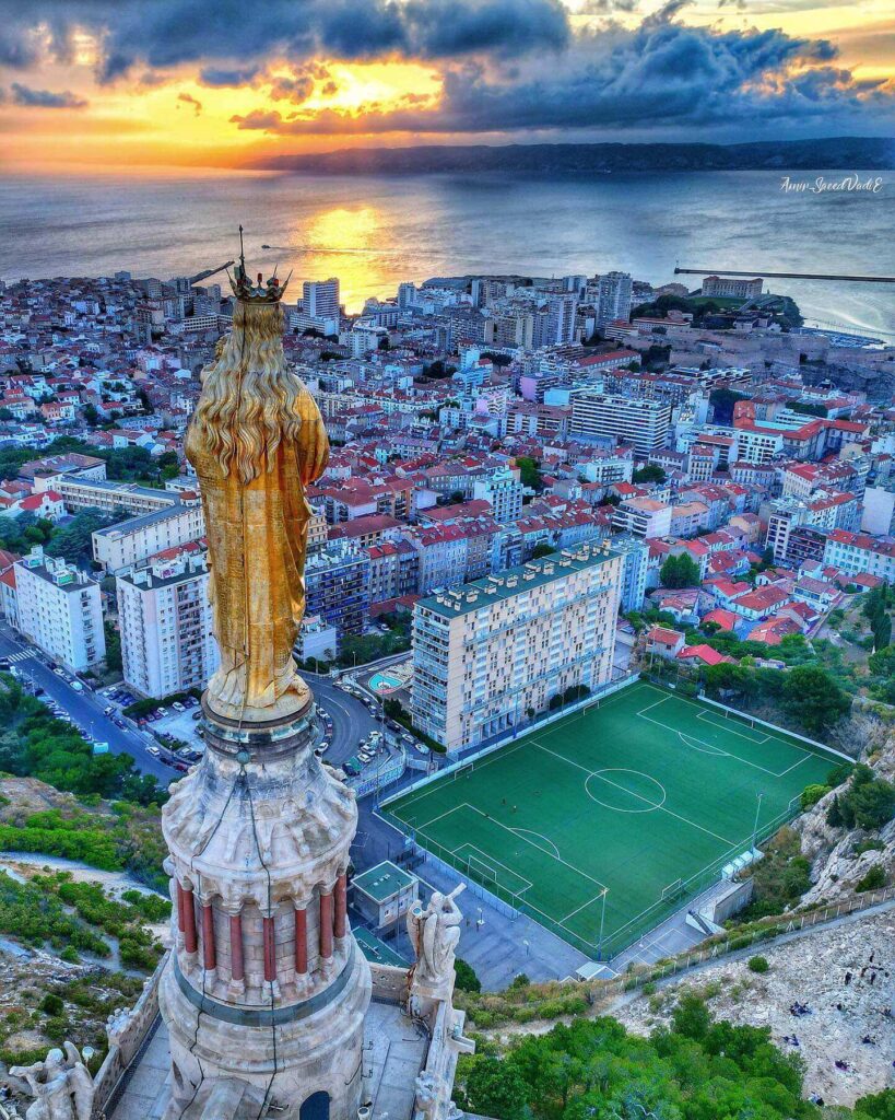 People watching sunset from Notre Dame de la Garde terraces