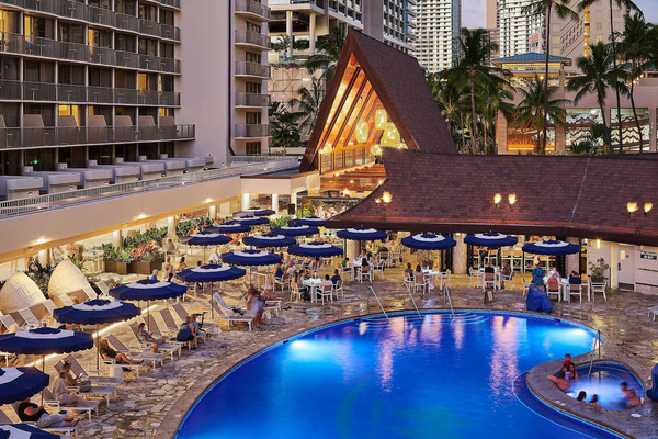 Beachfront exterior of Outrigger Reef Waikiki Beach Resort with tropical Waikiki ocean views