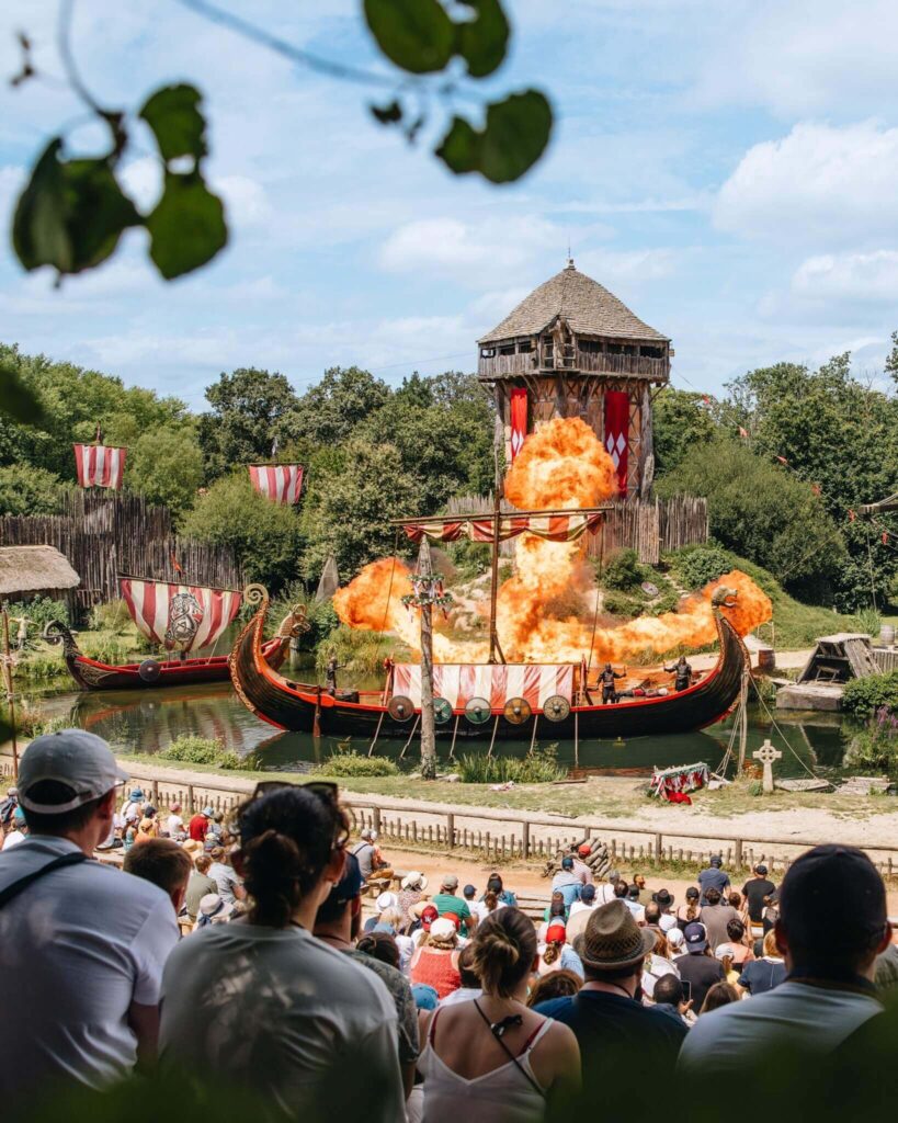 Visitors attending a popular summer show at Puy du Fou