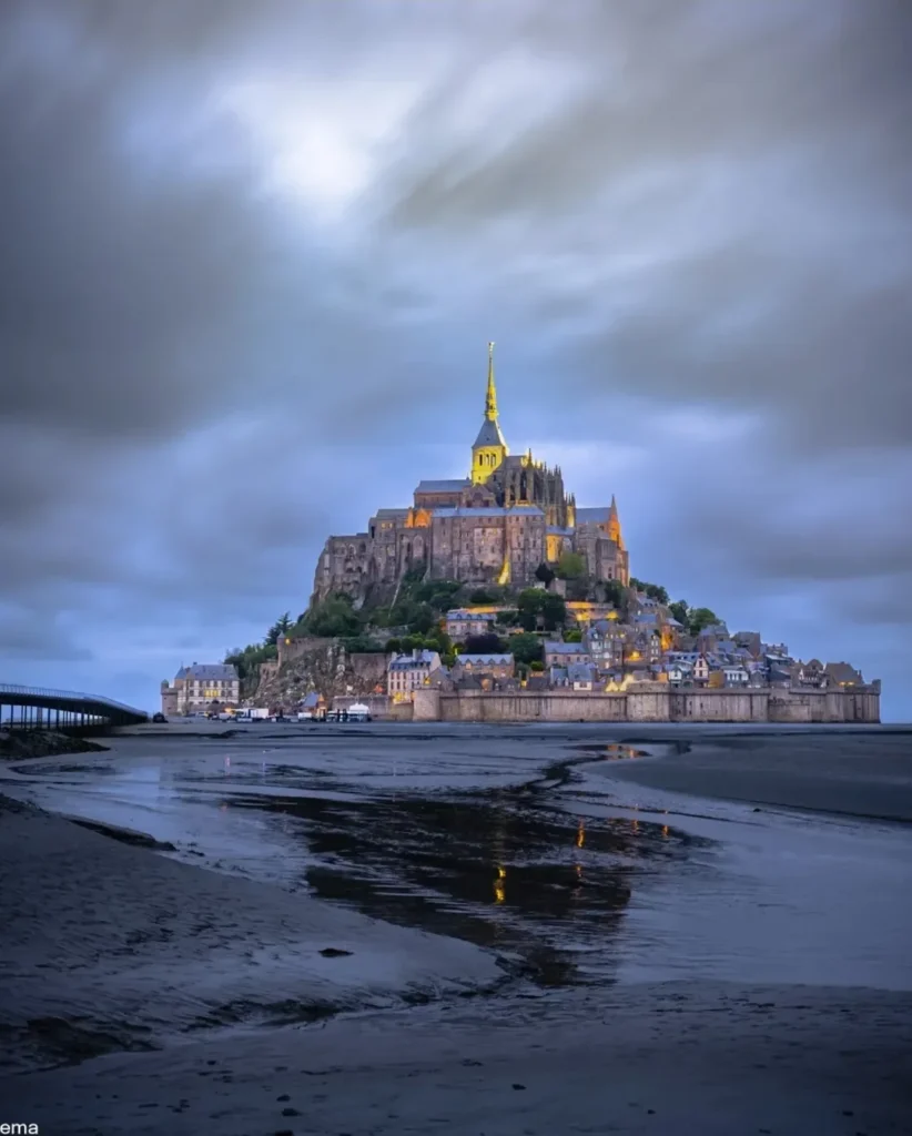 Rain reflections on medieval streets at Mont Saint Michel
